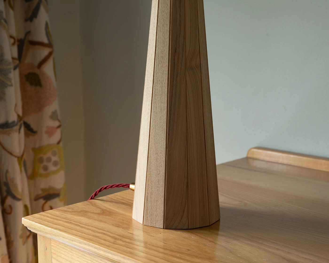 Detail of brass fitting and twisted fabric cable