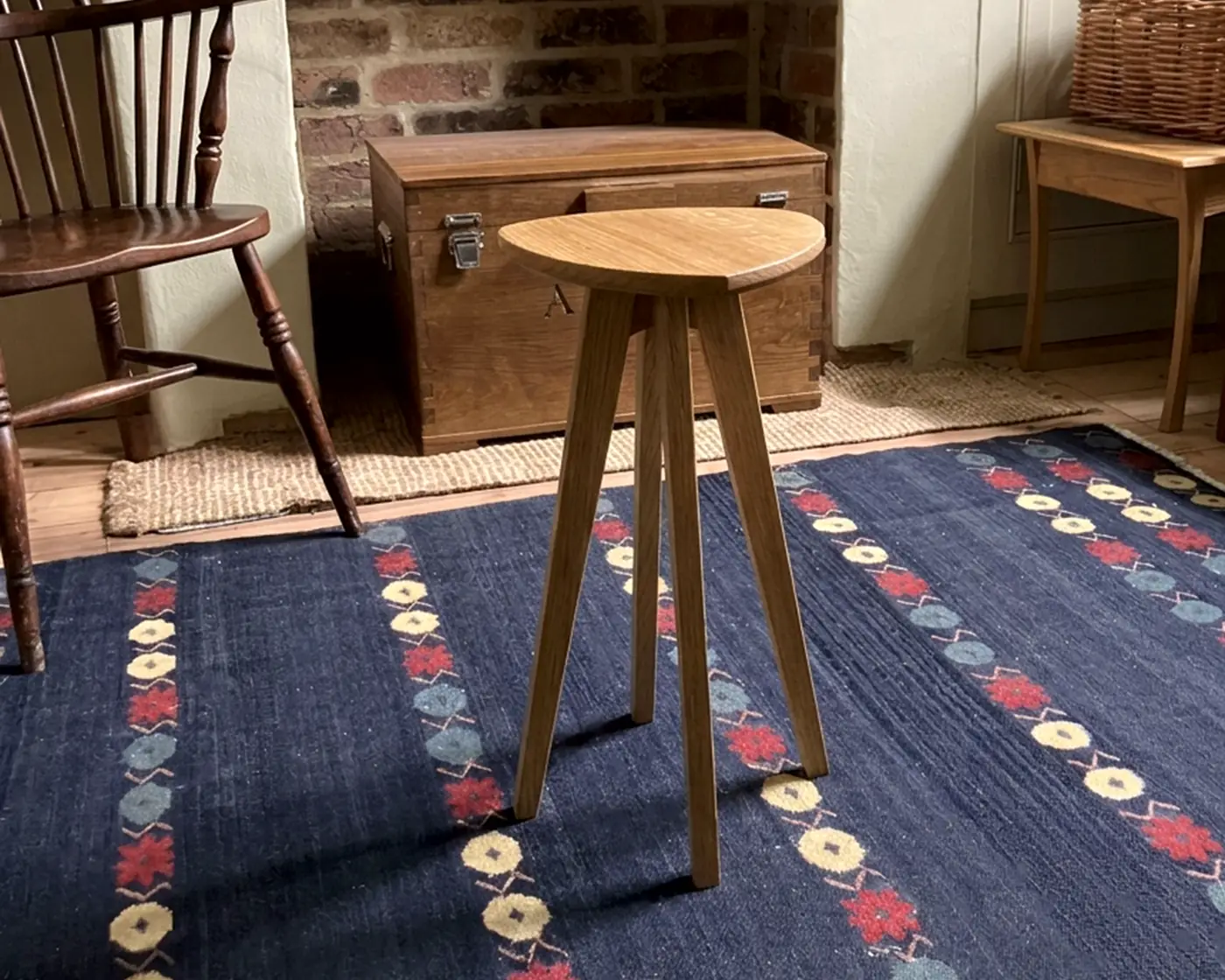 Solid oak side table with a uniquely shaped top